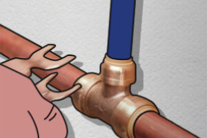 1. Slide the tongs over both the fitting & the pipe.