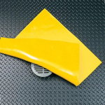 107767 18" x 18" Yellow Vinyl Slikstopper Drain Seal_noscript