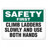 Sign "Safety First - Climb Ladders Slowly"_noscript